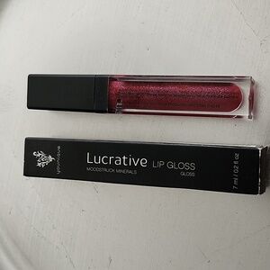 Younique lip gloss. New boxed product and a free tester. Love this gloss
